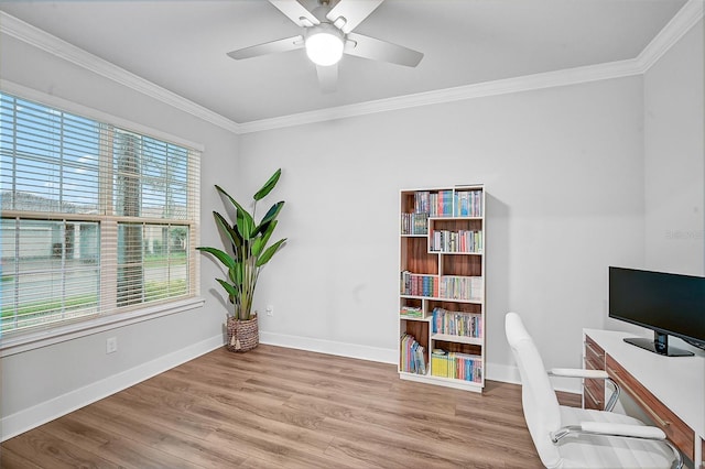 office area with light wood-type flooring, ceiling fan, and crown molding