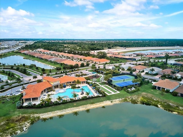 drone / aerial view with a water view