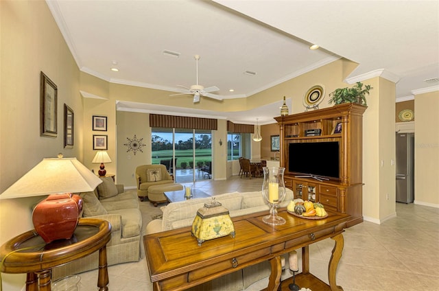 living room with light tile patterned floors, ceiling fan, and crown molding