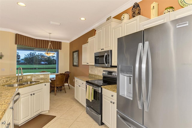 kitchen with sink, ornamental molding, decorative light fixtures, and appliances with stainless steel finishes