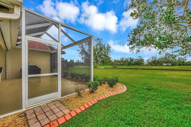 view of yard with a lanai