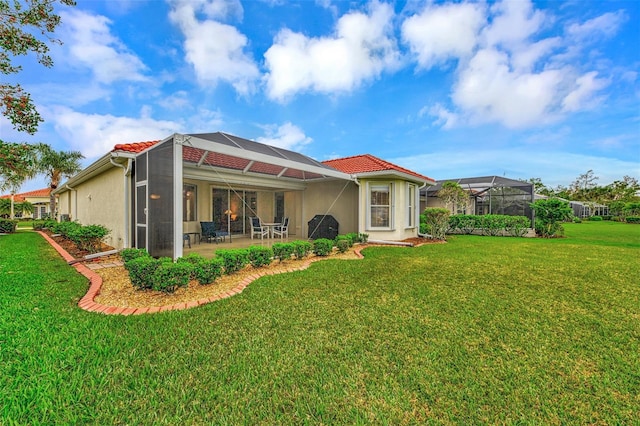 5633 Whispering Oaks Dr, North Port, FL 34287 - rear view of house featuring a tiled roof, stucco siding, a yard, and glass enclosure