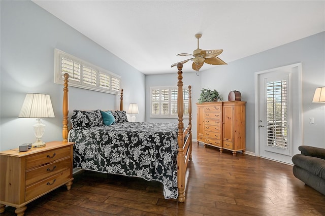 bedroom featuring dark hardwood / wood-style flooring, access to outside, and ceiling fan