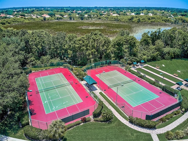 birds eye view of property with a water view