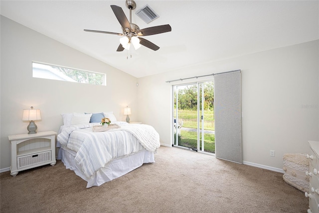 bedroom with ceiling fan, vaulted ceiling, access to outside, and multiple windows