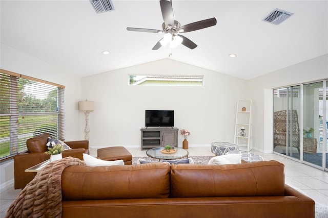 tiled living room featuring ceiling fan and lofted ceiling