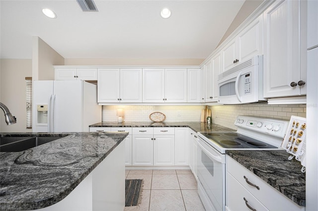 kitchen with sink, white cabinets, white appliances, and light tile patterned floors