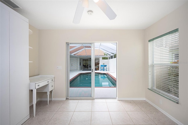 interior space featuring ceiling fan