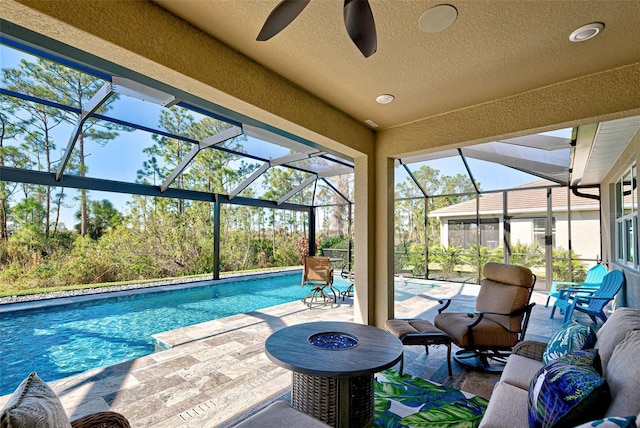 view of pool with a lanai and a patio