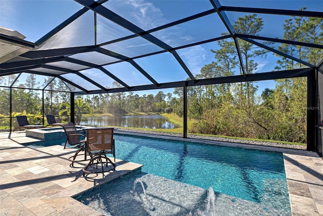 view of pool featuring pool water feature, a patio area, a water view, a hot tub, and a lanai