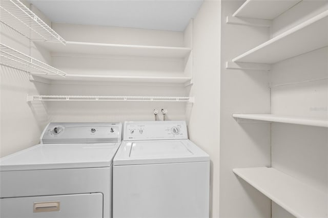 laundry area featuring washing machine and dryer