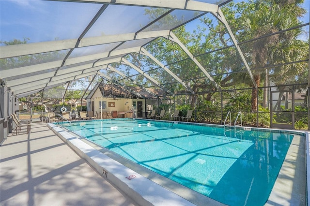 6906 Woodwind Dr Unit 12, Sarasota, FL 34231 - community pool with a patio and a lanai