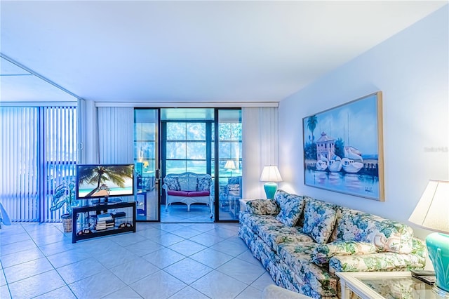 tiled living room featuring expansive windows