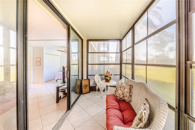 612 Bird Bay Dr S Unit 114, Venice, FL 34285 - sunroom / solarium featuring tile patterned floors and a wall of windows