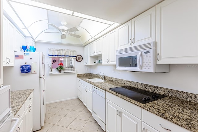 kitchen with white cabinetry, sink, ceiling fan, and white appliances