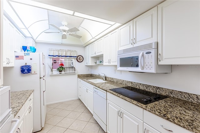 612 Bird Bay Dr S Unit 114, Venice, FL 34285 - kitchen featuring white appliances, a sink, and white cabinets