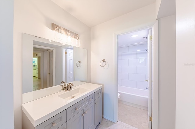 612 Bird Bay Dr S Unit 114, Venice, FL 34285 - full bathroom with vanity, toilet, tile patterned floors, and tub / shower combination
