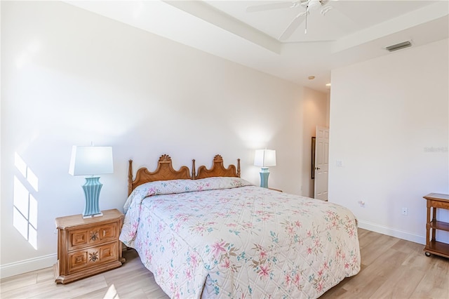 bedroom featuring light hardwood / wood-style floors and ceiling fan