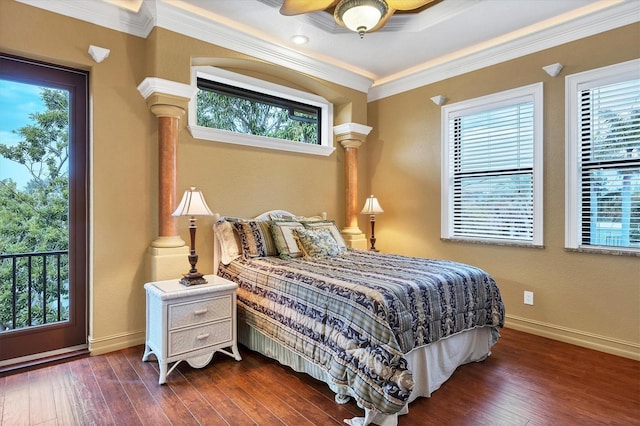 bedroom featuring multiple windows, crown molding, and dark wood-type flooring