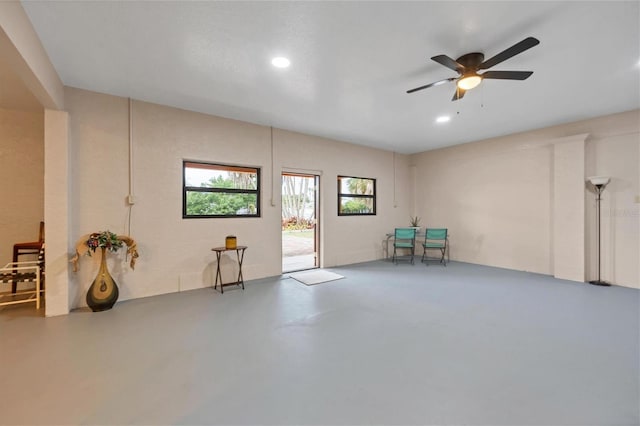 basement featuring ceiling fan