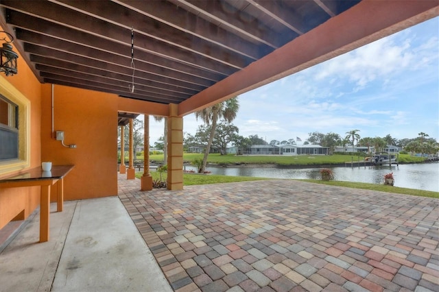 view of patio / terrace with a water view