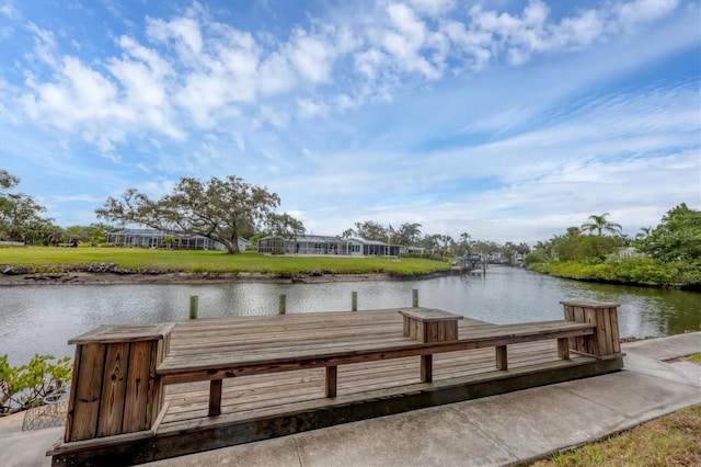 view of dock with a water view