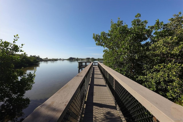 view of dock with a water view