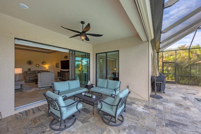 view of patio / terrace featuring an outdoor hangout area, glass enclosure, ceiling fan, and a grill