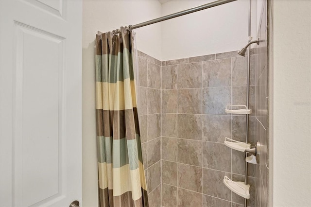 bathroom featuring walk in shower