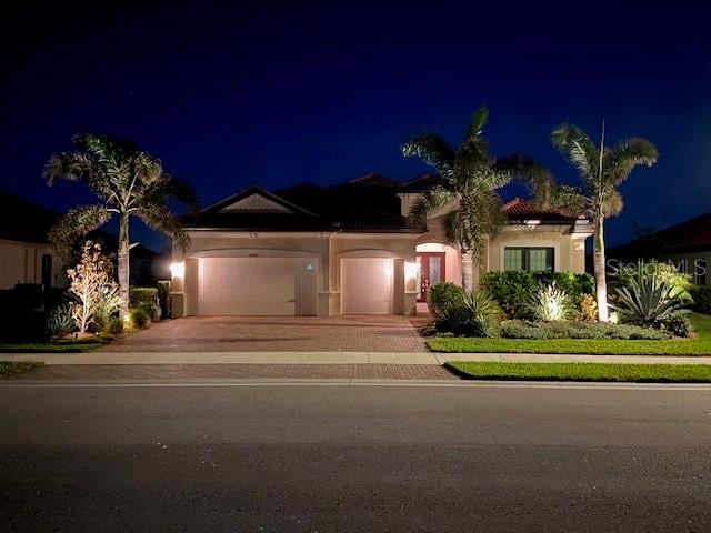 view of front of property with a garage