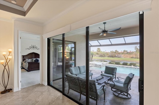 sunroom / solarium with ceiling fan