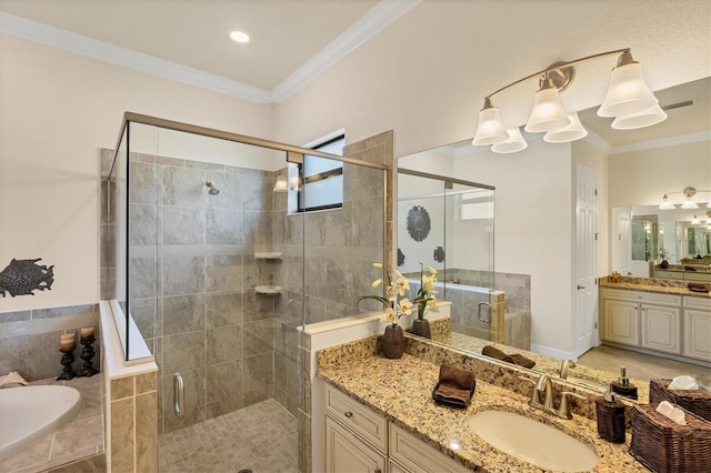 bathroom featuring vanity, separate shower and tub, and ornamental molding