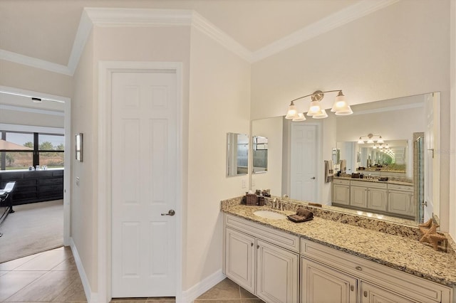 bathroom with tile patterned floors, vanity, and crown molding