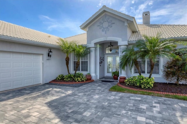 property entrance with a garage