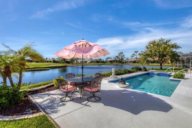 view of swimming pool with a water view and a patio area