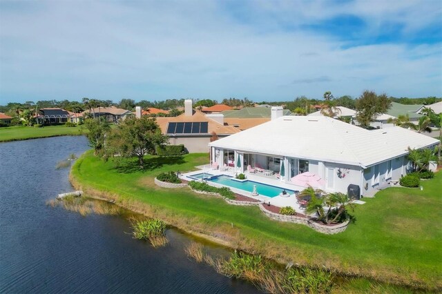 drone / aerial view with a water view