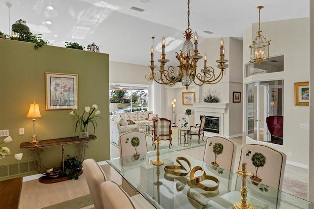 dining area with light hardwood / wood-style floors