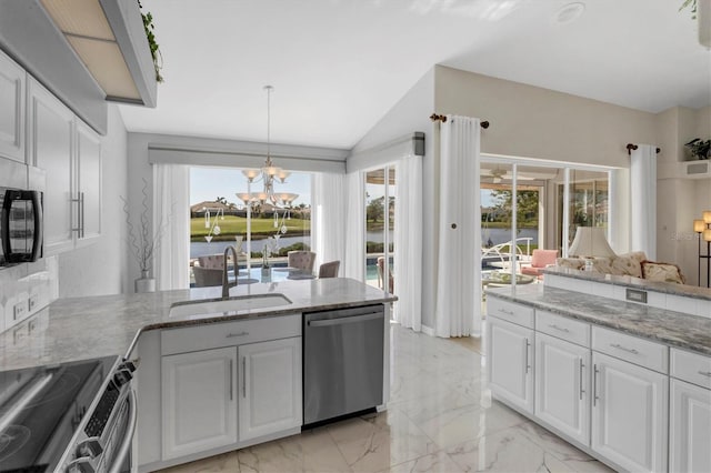 kitchen featuring white cabinetry, sink, and appliances with stainless steel finishes