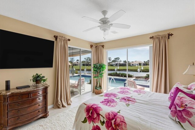 tiled bedroom featuring access to exterior, ceiling fan, and multiple windows