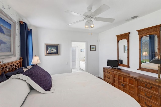 bedroom featuring ensuite bath, ceiling fan, and multiple windows