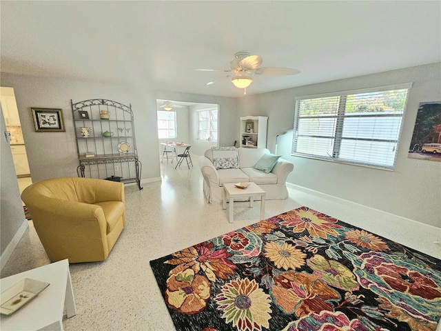 living room with ceiling fan