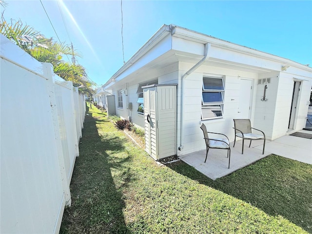 view of property exterior featuring a yard