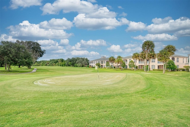 view of home's community with a lawn