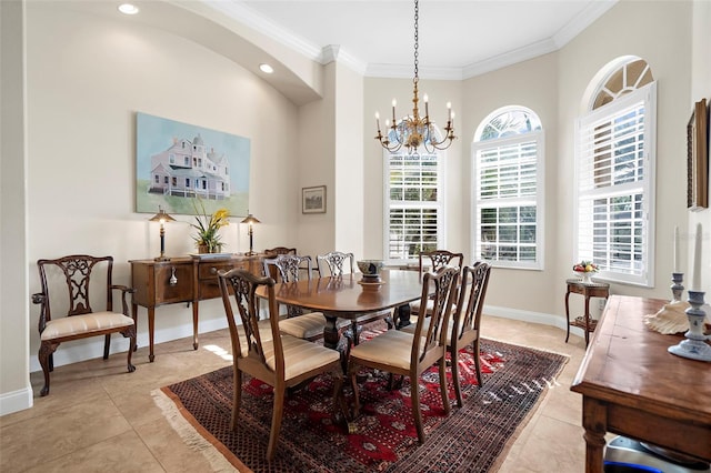 dining space featuring crown molding, light tile patterned floors, and a chandelier