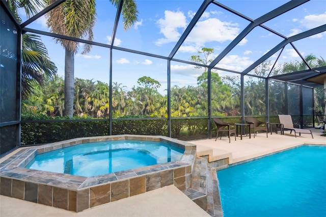 view of pool featuring a lanai and a patio