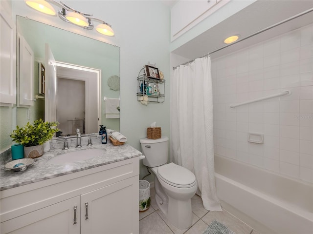 full bathroom featuring tile patterned flooring, vanity, toilet, and shower / tub combo