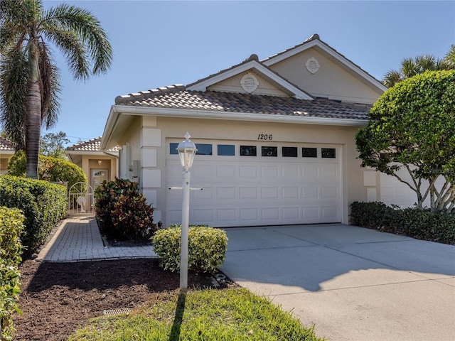 view of front of property featuring a garage