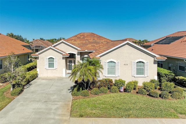 view of front facade with a front yard