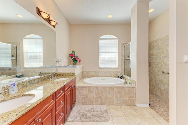 bathroom with vanity, separate shower and tub, and tile patterned floors