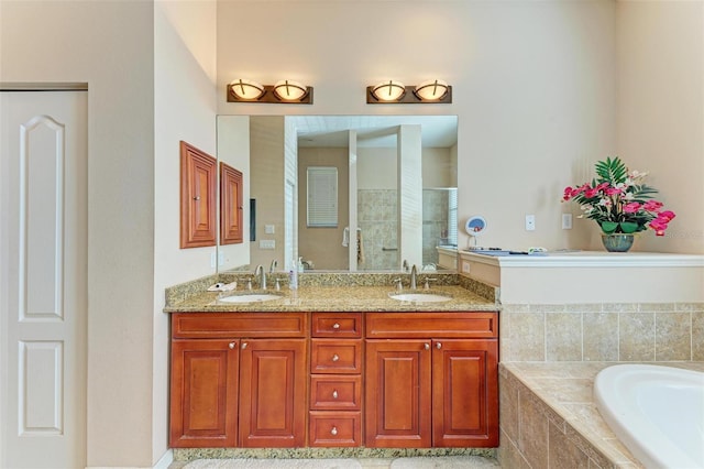 bathroom featuring vanity and plus walk in shower